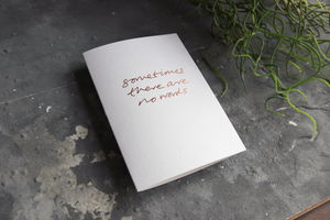 this luxury sage green colour paper greetings card is hand foiled with the phrase 'Wish I Knew What To Say'