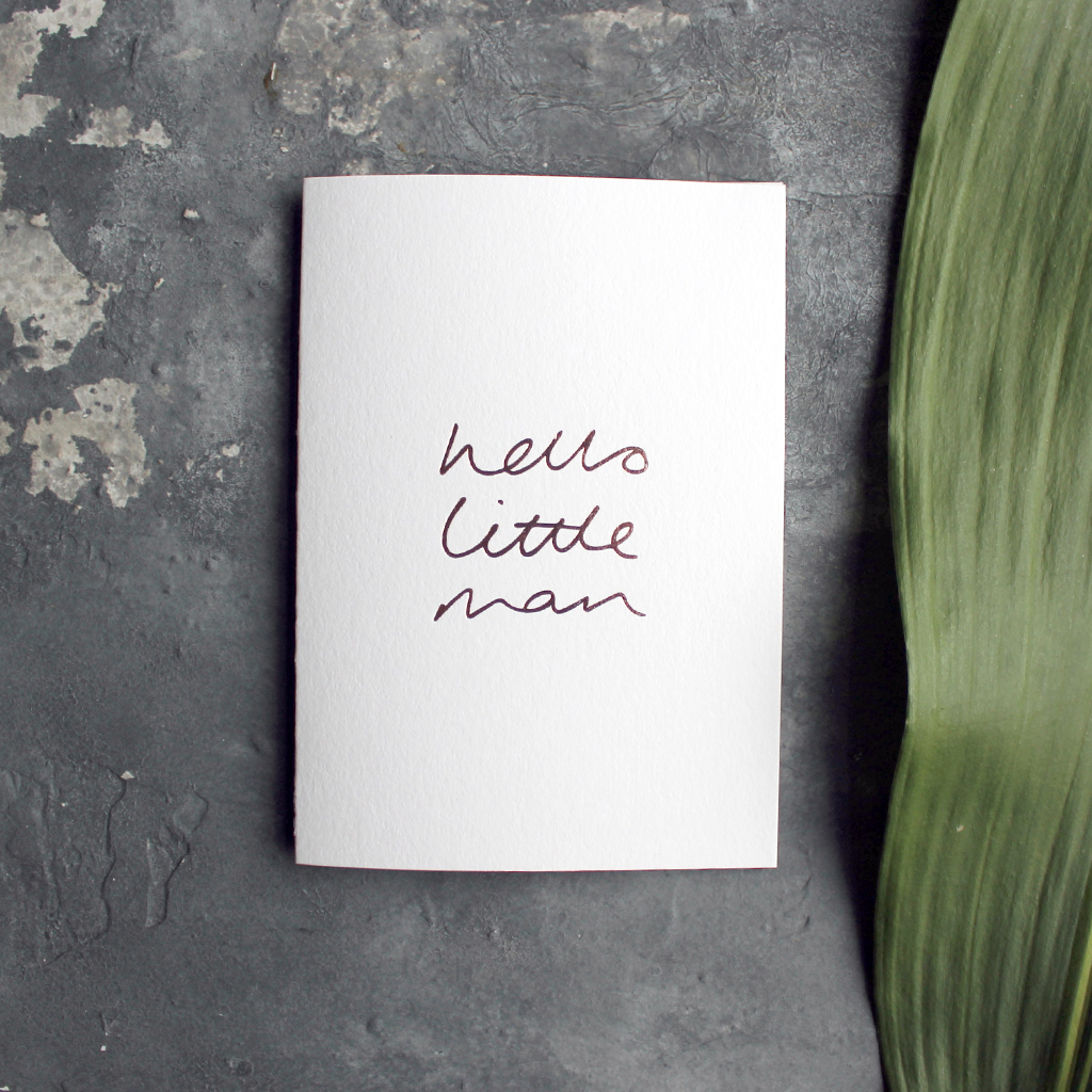 Hello Little Man is a luxury baby card hand printed in Rose Gold Foil