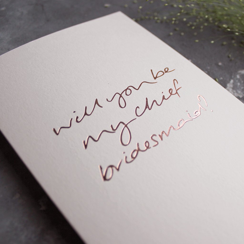 This luxury card is hand foiled in rose gold asking Will You Be My Chief Bridesmaid? on the front on blush paper