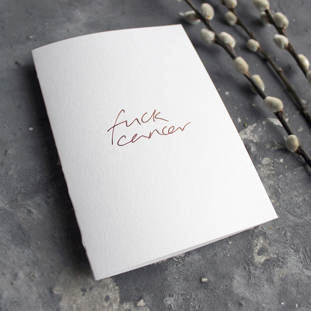 This luxury hand foiled card says 'Fuck Cancer' on the front on white paper