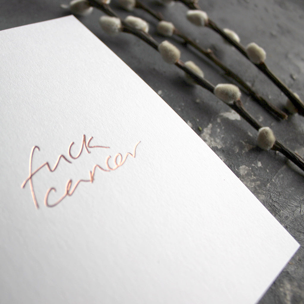 This luxury hand foiled card says 'Fuck Cancer' on the front on white paper