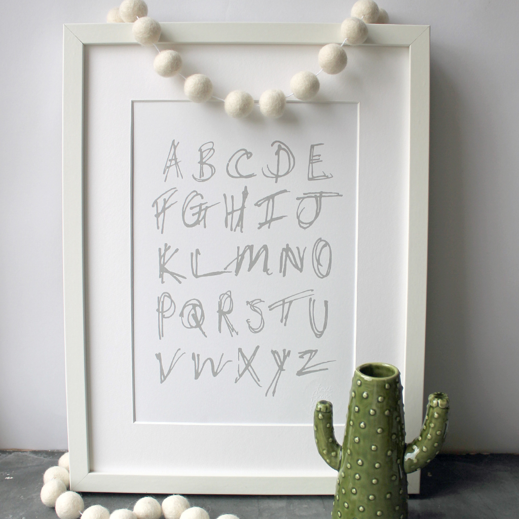 This children's alphabet print is a unique hand drawn typography design in grey letters on white paper.  