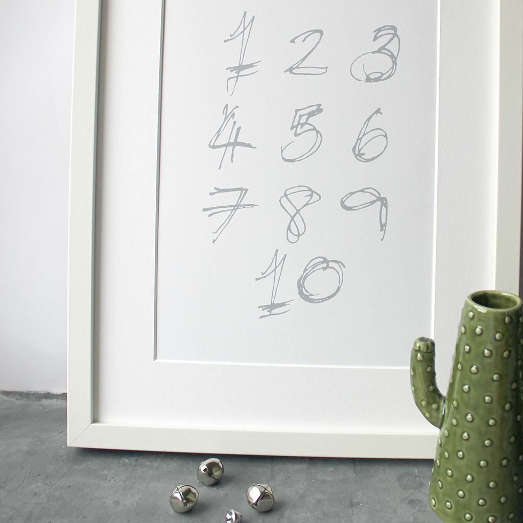 This children's one to ten numbers print is a unique hand drawn typography design in grey on white paper. 