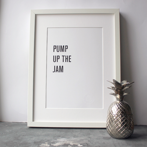 The lyrics 'Pump up the jam' are typographically designed and digitally printed in this frame