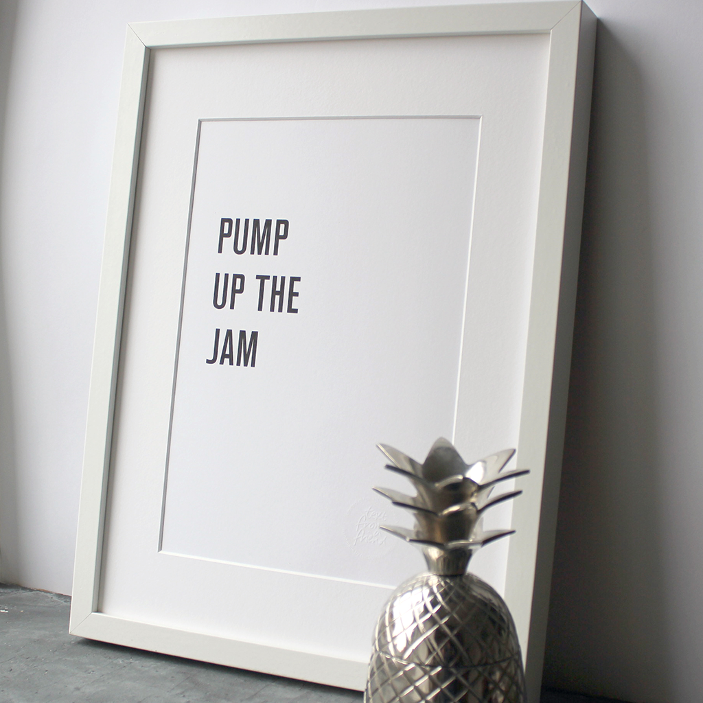 The lyrics 'Pump up the jam' are typographically designed and digitally printed in this frame