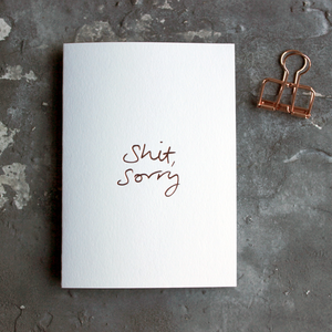 This one little word 'Shit Sorry' is on the front, handwritten and hand foiled in rose gold