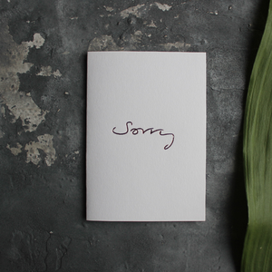 This one little word 'Sorry' is on the front, handwritten and hand foiled in rose gold