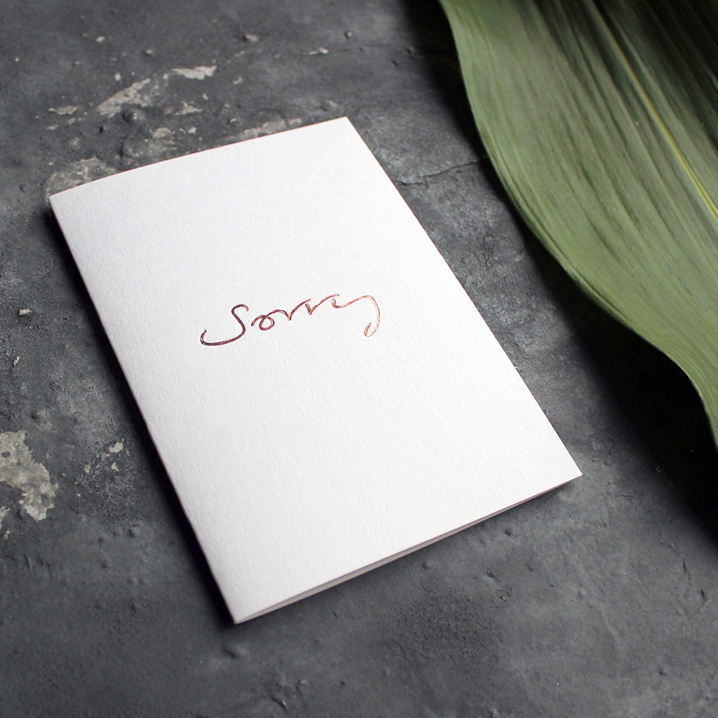 This one little word 'Sorry' is on the front, handwritten and hand foiled in rose gold