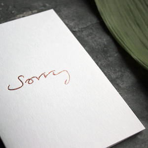 This one little word 'Sorry' is on the front, handwritten and hand foiled in rose gold