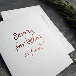 Sorry For Being A Fud postcard in rose gold foil blocking
