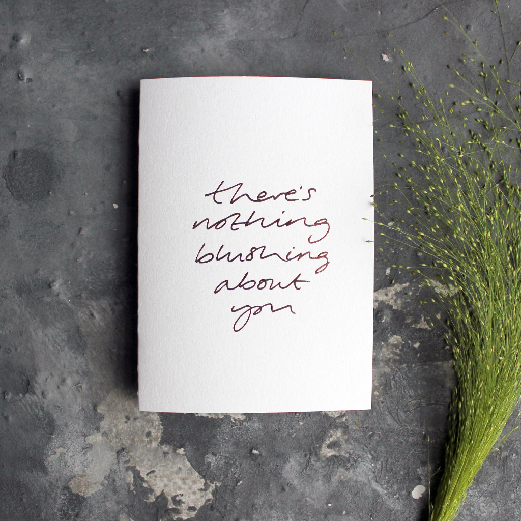 This hand foiled luxury card states 'There's Nothing Blushing About You' on the front of it
