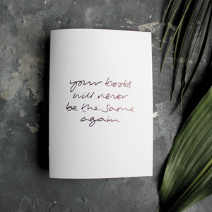 The front of the card says Your Boobs Will Never Be The Same Again hand foiled in Rose Gold