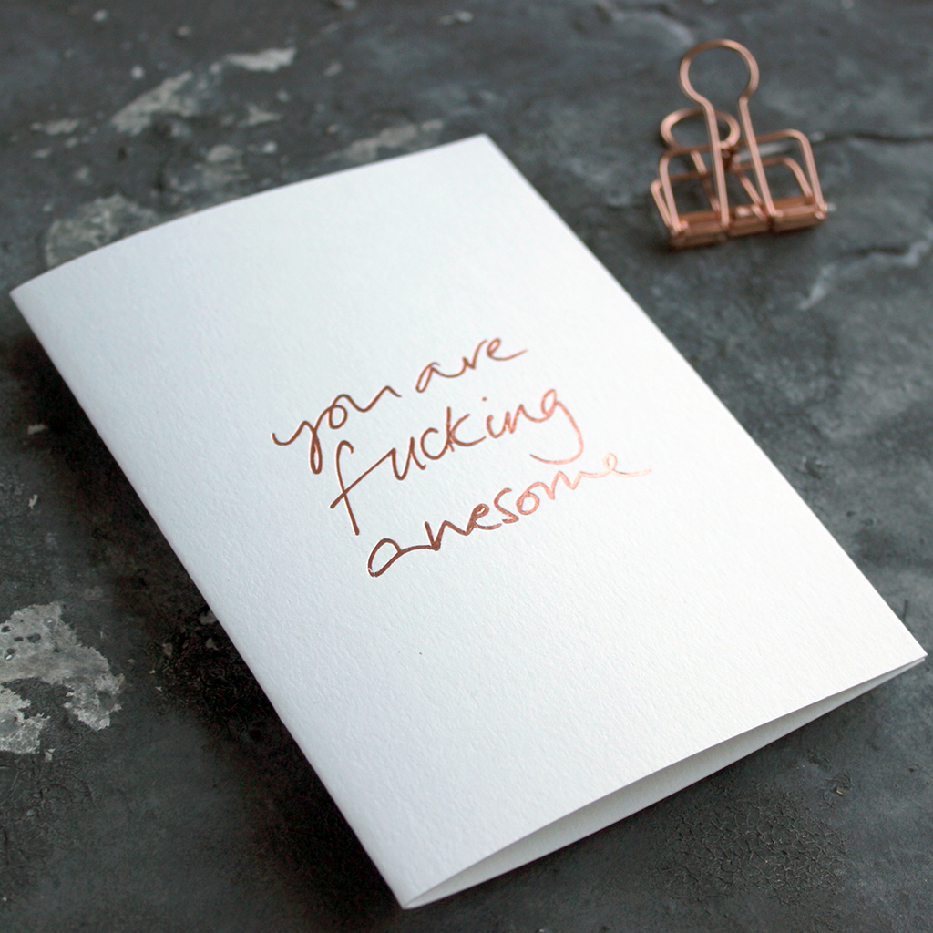 You Are Fucking Awesome is a luxury white card hand foiled in rose gold on the front