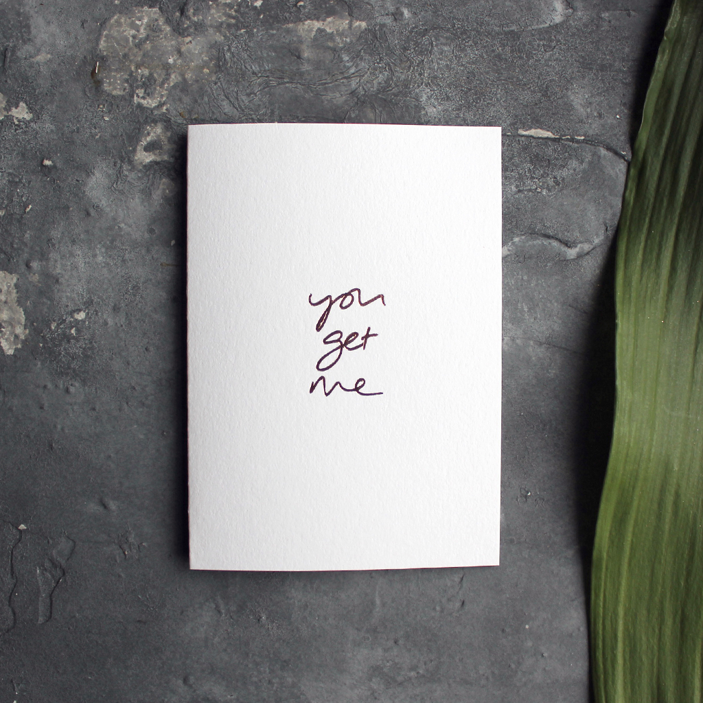 the handwritten words 'you get me' are hand foiled in rose gold on the front of the card