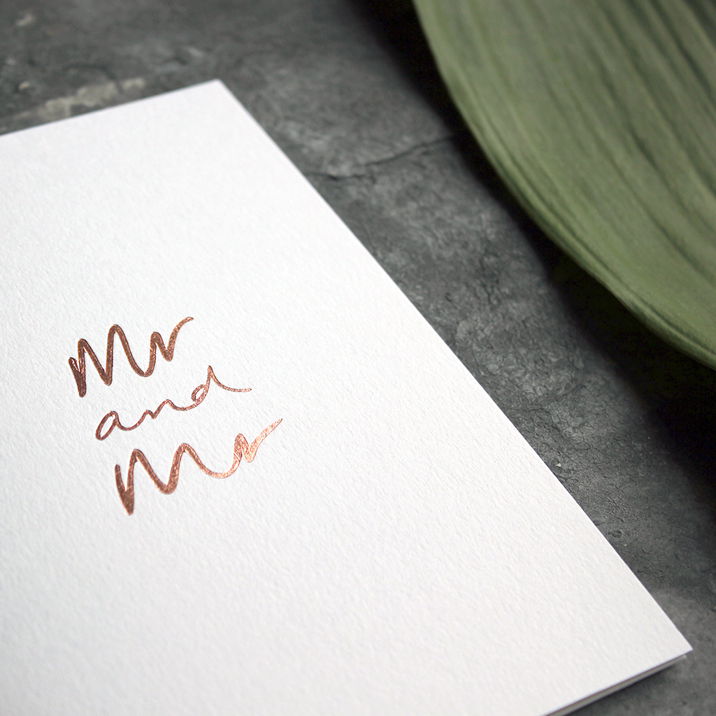 this luxury wedding card for the gay couple says Mr and Mr on the front, handwritten and hand foiled in rose gold